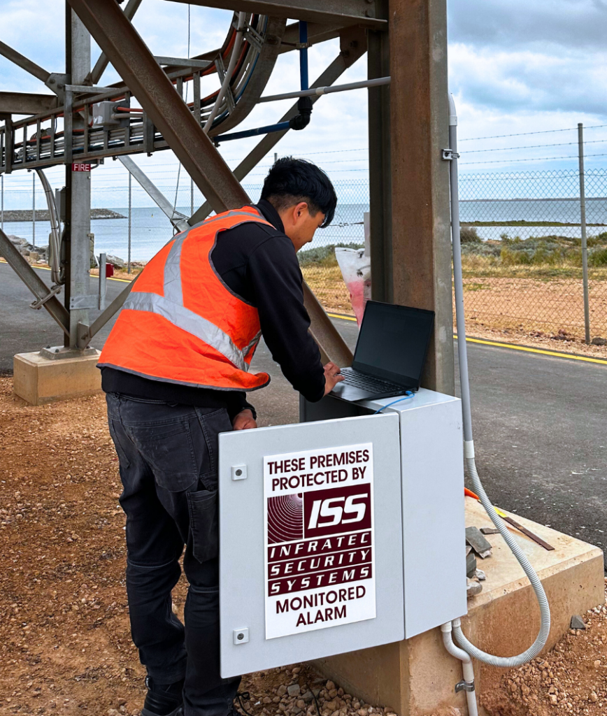 INFRATEC SECURITY TECHNICIAN IS PROGRAMMING AN INTEGRITI SECURITY SOFTWARE IN OUTSIDE JOB SITE